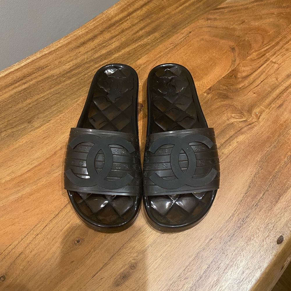 Chanel black jelly slides